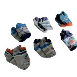 Pack of six assorted baby boys socks. Size 12-18 months.